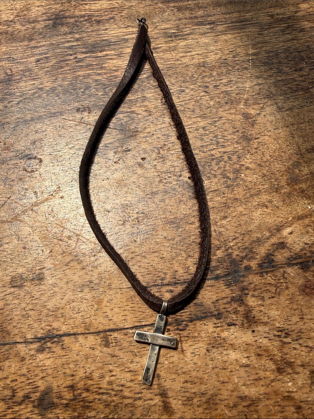 Native American sterling silver cross on a Brown Suede Cord Cross Necklace